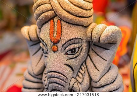 Colorful dolls made of clay Lord Ganesha handicrafts on display during the Handicraft Fair in Kolkata earlier Calcutta West Bengal India. It is the biggest handicrafts fair in Asia.