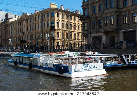St. Petersburg, Russia - June 4 2017. several pleasure boats on the piers on the Moika River