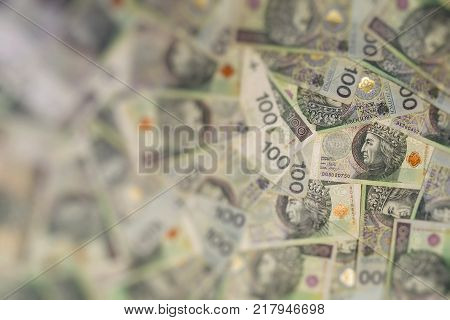 Polish currency banknotes as a background 100 zl
