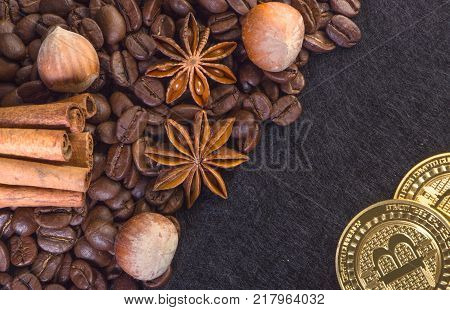 Gold Bitcoin surround by coffee bean close up