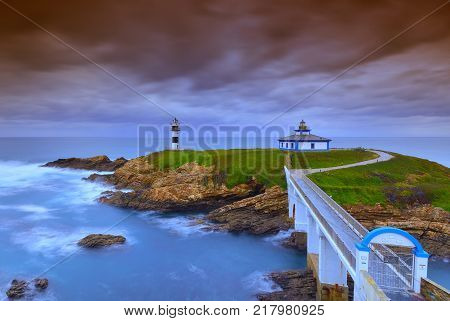 View of Pancha Island in Ribadeo Lugo before a storm.