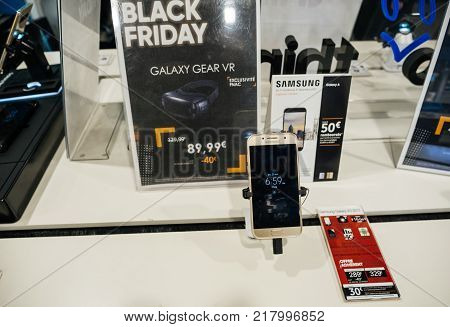 PARIS FRANCE - NOV 23 2017: Black Friday store shopping day in France Paris with customers people buying electronics gadget in Fnac retail chain - martphone Samsung Galxy for sale