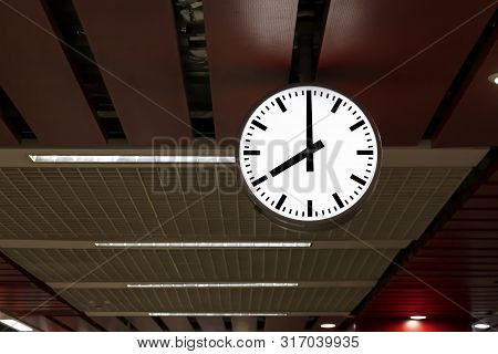 Public Clock In Railway Station At The Hanging With Roof Of Subway Central Station. It Is Clock For 