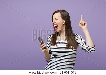 Young Brunette Woman Girl In Casual Striped Clothes Posing Isolated On Violet Purple Background Stud