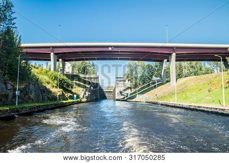 Lappeenranta, Finland - August 7, 2019: Lock And Bridge On The Saimaa Canal At Malkia. View From Wat