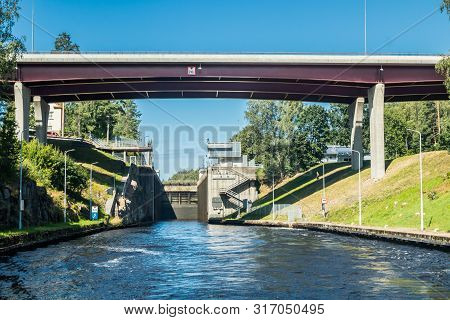 Lappeenranta, Finland - August 7, 2019: Lock And Bridge On The Saimaa Canal At Malkia. View From Wat