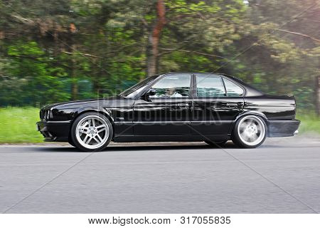 Kiev, Ukraine. May 17, 2014. Bmw M5 (e34) Against The Background Of The Forest