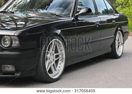 Kiev, Ukraine. May 17, 2014. Bmw M5 (e34) Against The Background Of The Forest. On The Bmw Wheels Sc