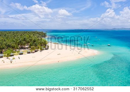 Seascape With A Beautiful Island. Daco Island, Philippines. Tropical Island With A White Sandy Beach