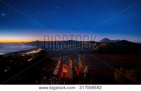 Star And Bromo Mountain Between Night And Sunrise Time At Seruni View Point, Java Island, Indonesia