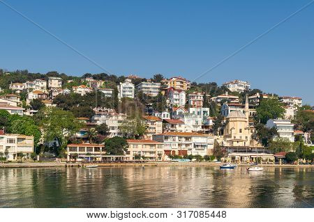 Istanbul, Turkey - April 27 2017: View Of Burgazada Island From The Sea With Summer Houses And A Sma