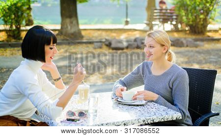 True Friendship Friendly Close Relations. Trust Her. Girls Friends Drink Coffee And Enjoy Talk. Conv