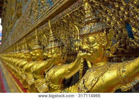 Golden Statues Of Garuda In The Grand Palace