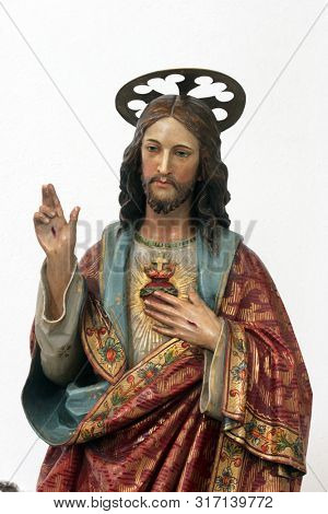 KLOSTAR IVANIC, CROATIA - SEPTEMBER 25, 2011: Sacred Heart of Jesus, statue on the altar of the Saint Joseph in the Church of the Assumption of the Virgin Mary in Klostar Ivanic, Croatia