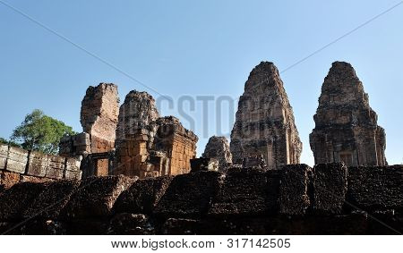 Stone Towers Of A Medieval Khmer Temple. Baray Eastern Mebon.