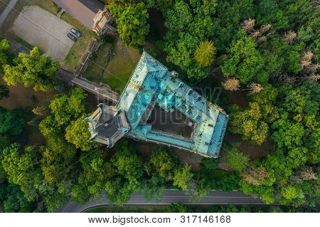 Aerial View Of Old Castle In Green Wood