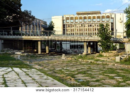 Stara Zagora, Bulgaria - August 5, 2018: Sunset View Of Regional Library And Ruins Of Ancient August