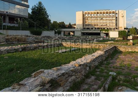 Stara Zagora, Bulgaria - August 5, 2018: Sunset View Of Regional Library And Ruins Of Ancient August