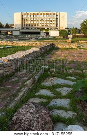 Stara Zagora, Bulgaria - August 5, 2018: Sunset View Of Regional Library And Ruins Of Ancient August