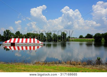 Low Land Near The Mississippi River Receives Flood Damage As Evidenced By This Flooded Fireworks Sta