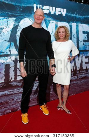 LOS ANGELES - AUG 12: Derek Mears, Virginia Madsen at the Premiere Of SyFy's 