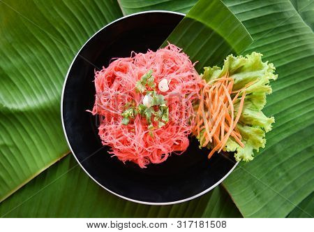 Rice Vermicelli Pink Frying And Vegetable / Stir Fried Rice Noodles With Red Sauce Served On Plate O
