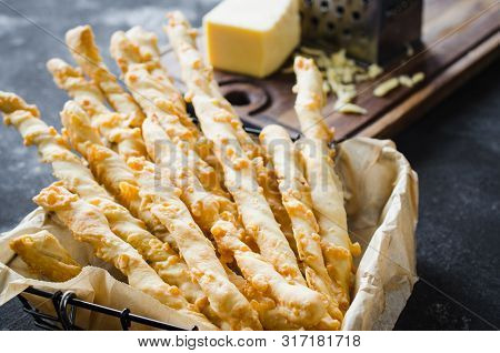 Cheese Stick. Breadsticks With Cheese On Dark Background, Concept For Snack Or Party Time