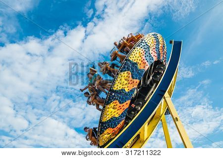 Kouvola, Finland - 10 August 2019: Ride Trombi In Motion On Sky Background In Amusement Park Tykkima