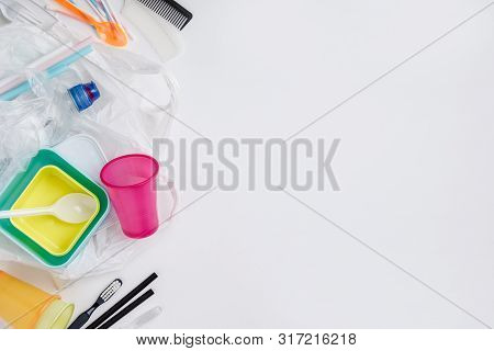 Plastic Items On White Background, Flat Lay