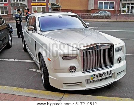 August 25, 2010. Ukraine - Kiev. White Rolls-royce Phantom Mansory Conquistador In The Parking Lot
