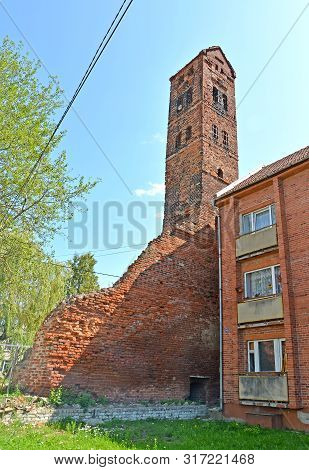 View Of Clock Tower Of The Medal Ragnit Lock ((the 15th Century). City Of Neman, Kaliningrad Region
