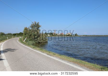 Small Road In Mesole Town And The Adriatic Sea Near The Venice Island