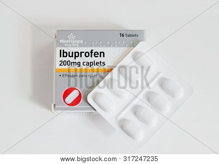London / Uk - July 8th 2019 - Packet Of Ibuprofen Painkillers, Closeup With Blister Pack Of Tablets