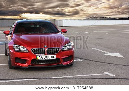 Kiev, Ukraine; June 25, 2013; Red Bmw M6 In The City