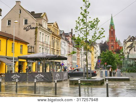 Bergen, Norway 07/18/2019 The Street Trogallmenningen In The Norwegian City Bergen In The Rainy Day 