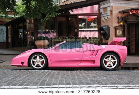 Kiev, Ukraine; May 17, 2016. Pink Ferrari Modena F360 Spider Sbarro Gt8