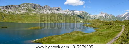 View At Lake Tannensee Over Engelberg In The Swiss Alps