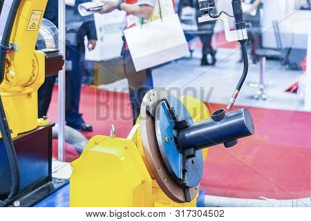 Metal Pipe Or Tube Setting On Chuck Prepare For Assembly By Modern And Automatic Electric Mig Weldin