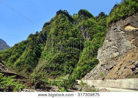 North Korea. Local Road Between Rocks In Ulim Mountains.