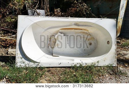 Old Broken Bath Dumped. Bath Hole, Bathroom Restoration