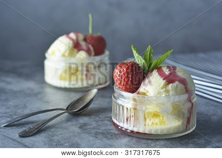 Delicious Vanilla Ice Cream With Mint Leaves And Strawberries, Sweet Dessert.