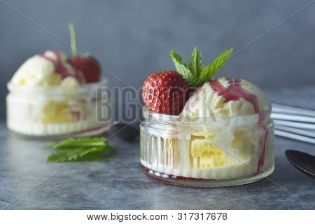 Delicious Vanilla Ice Cream With Mint Leaves And Strawberries, Sweet Dessert.