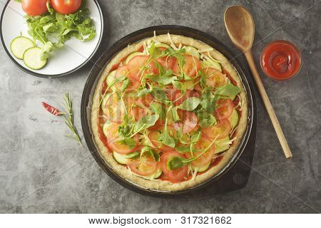 Vegetarian Pizza. Cooking Process Of Vegetable Homemade Pizza With Fresh Ingredients Isolated On Dar