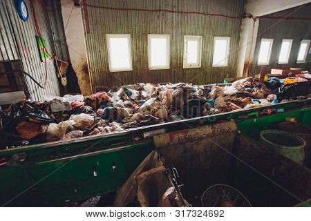 Ufa, Russia, 1 July, 2019: Conveyor Belt At Recycling Plant Transports Garbage Inside Drum Filter Or