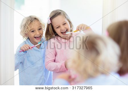 Child Brushing Teeth. Kids With Toothpaste, Brush.