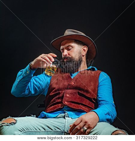 Man With Beard Holds Glass Brandy. Bad Habit - Alcohol Addiction. Addicting To Alcoholic Drink. Alco