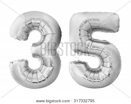Number 35 Thirty Five Made Of Silver Inflatable Balloons Isolated On White Background. Pink Helium B