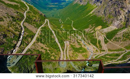 Trolls Path Trollstigen Winding Scenic Mountain Road With Many Cars, Norway Europe. National Tourist
