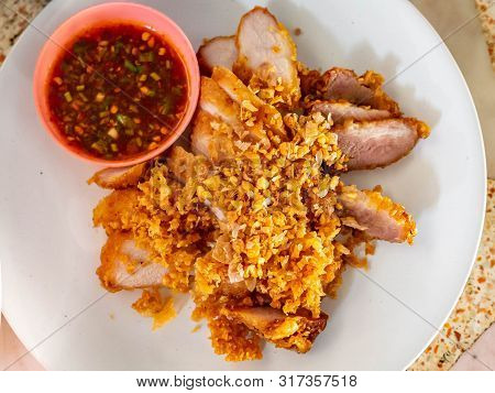 Garlic Fried Pork,good Tasty Food,in Restaurant At Market (sampeng),bangkok,thailand,food Thai