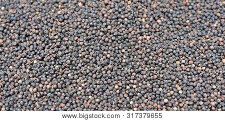 Organic Dry Black Pepper As Background Image